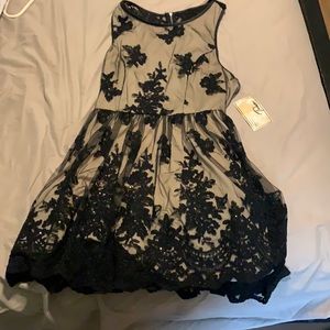 Black and cream party dress